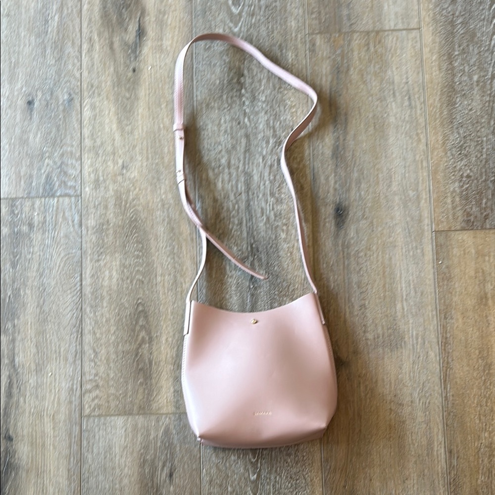 Chic Pink Crossbody Bag with Minimalist Design